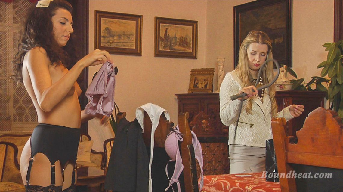 slave lesbian strips off for blonde mistress